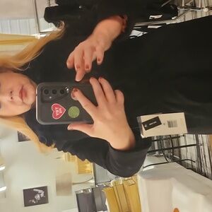 A black stylish wrap coat